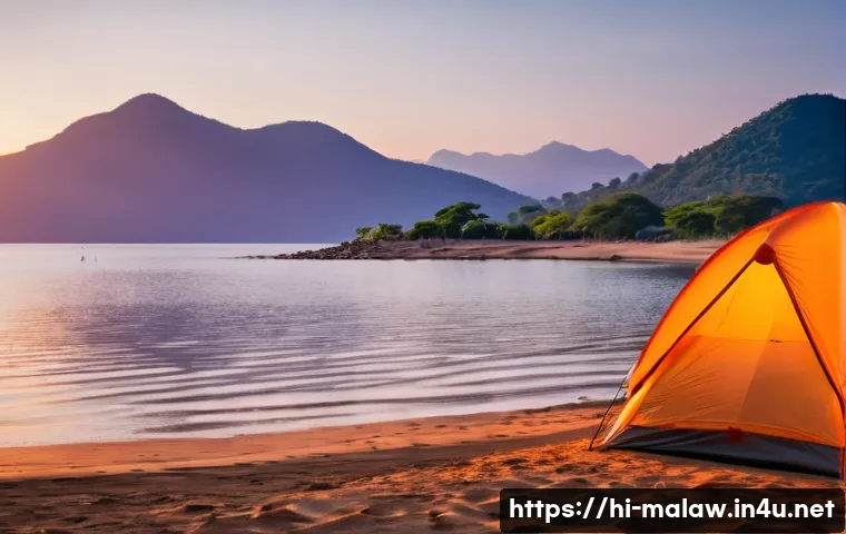 말라위에서 텐트 캠핑하기 - **Serene Sunrise over Lake Malawi Camping:**
A breathtaking wide shot capturing a vibrant sunris...